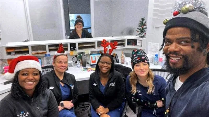 Image of APICO Pain and Wellness staff in hoiday attire at the Bear, Delaware office