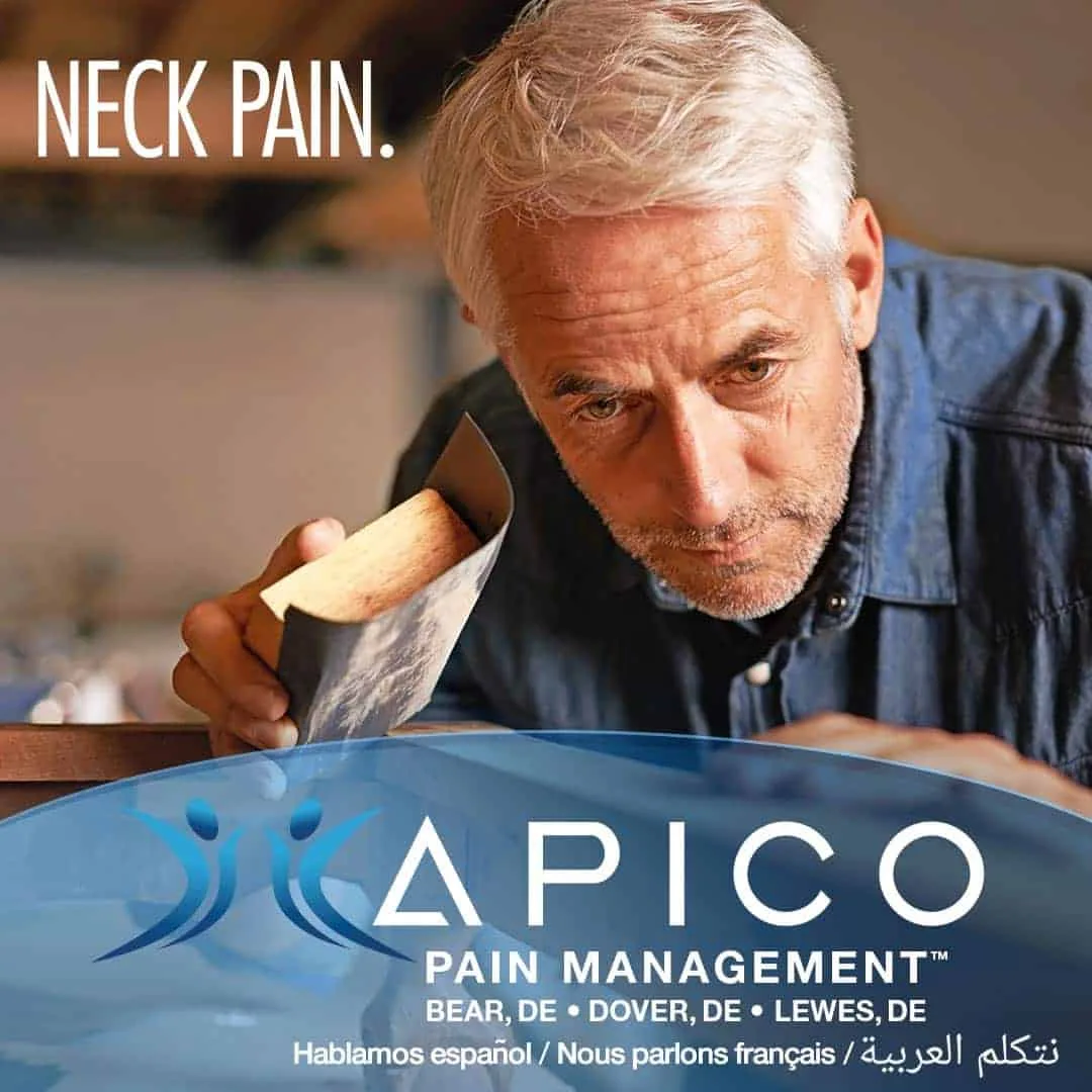 Image of a man sanding wood, experiencing neck pain.