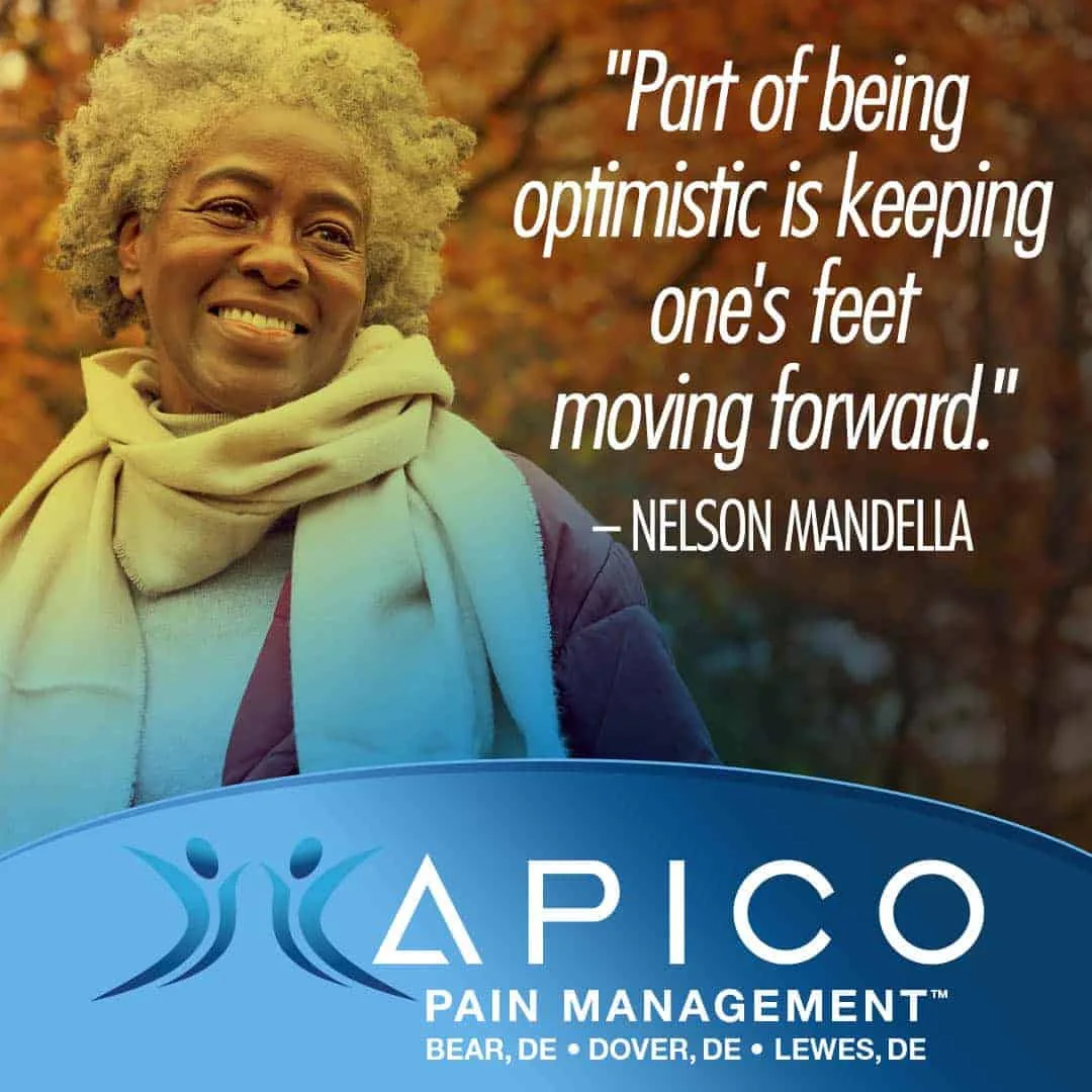 Image of a woman smiling who has beaten her pain, and is moving forward with her life.
