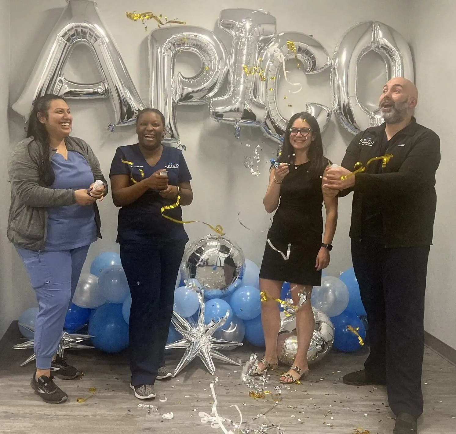Photo of APICO Pain Management staff celebrating first year anniversay.