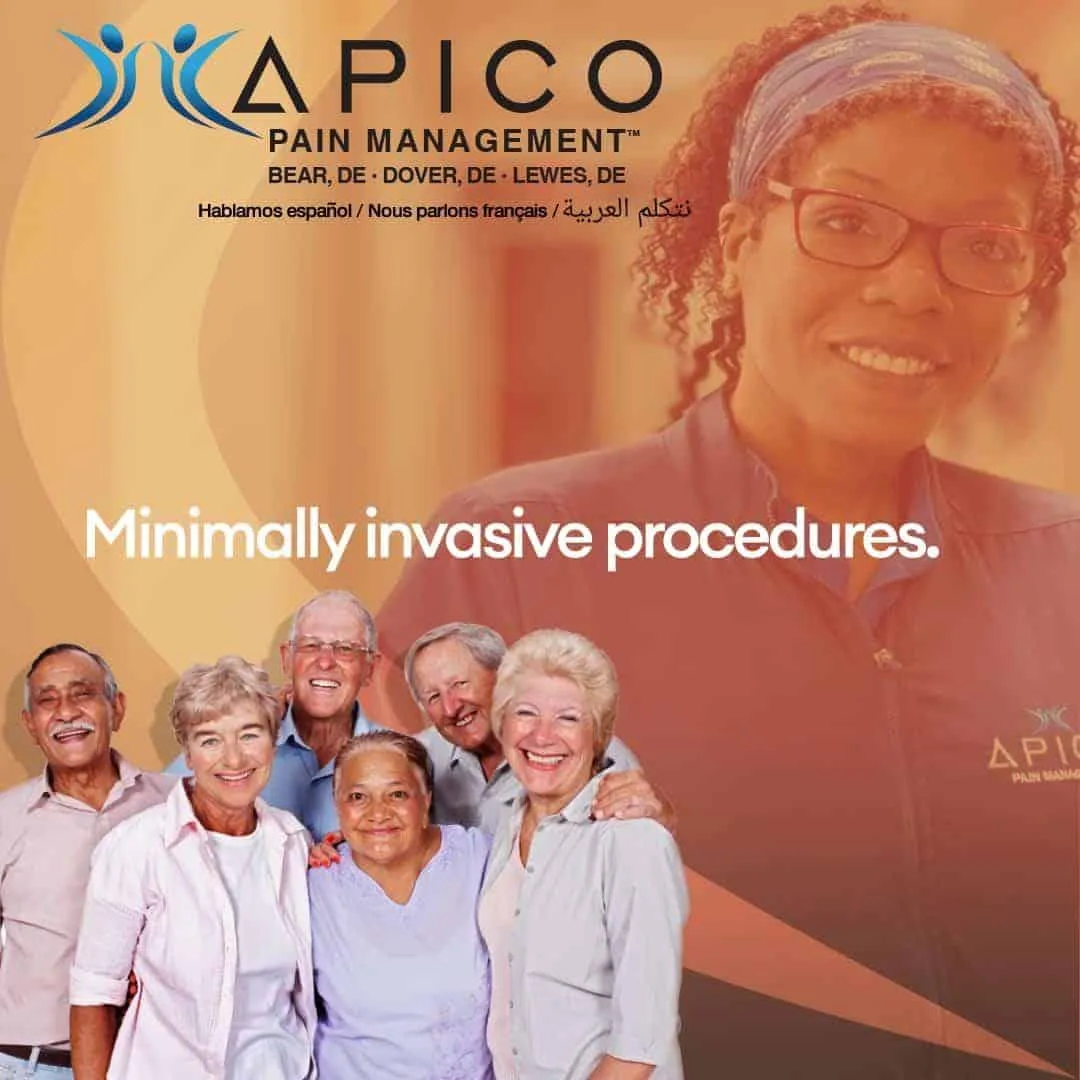 Group of diverse adults standing together and smiling in front of an APICO Pain Management promotional background, featuring the APICO logo, clinic locations in Bear, Dover, and Lewes, Delaware, and the phrase "Minimally invasive procedures." A healthcare professional in APICO attire stands behind the group.