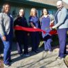 Photo of Dr. Abdallah cutting the ribbon at the grand opening of his new Lewes DE office