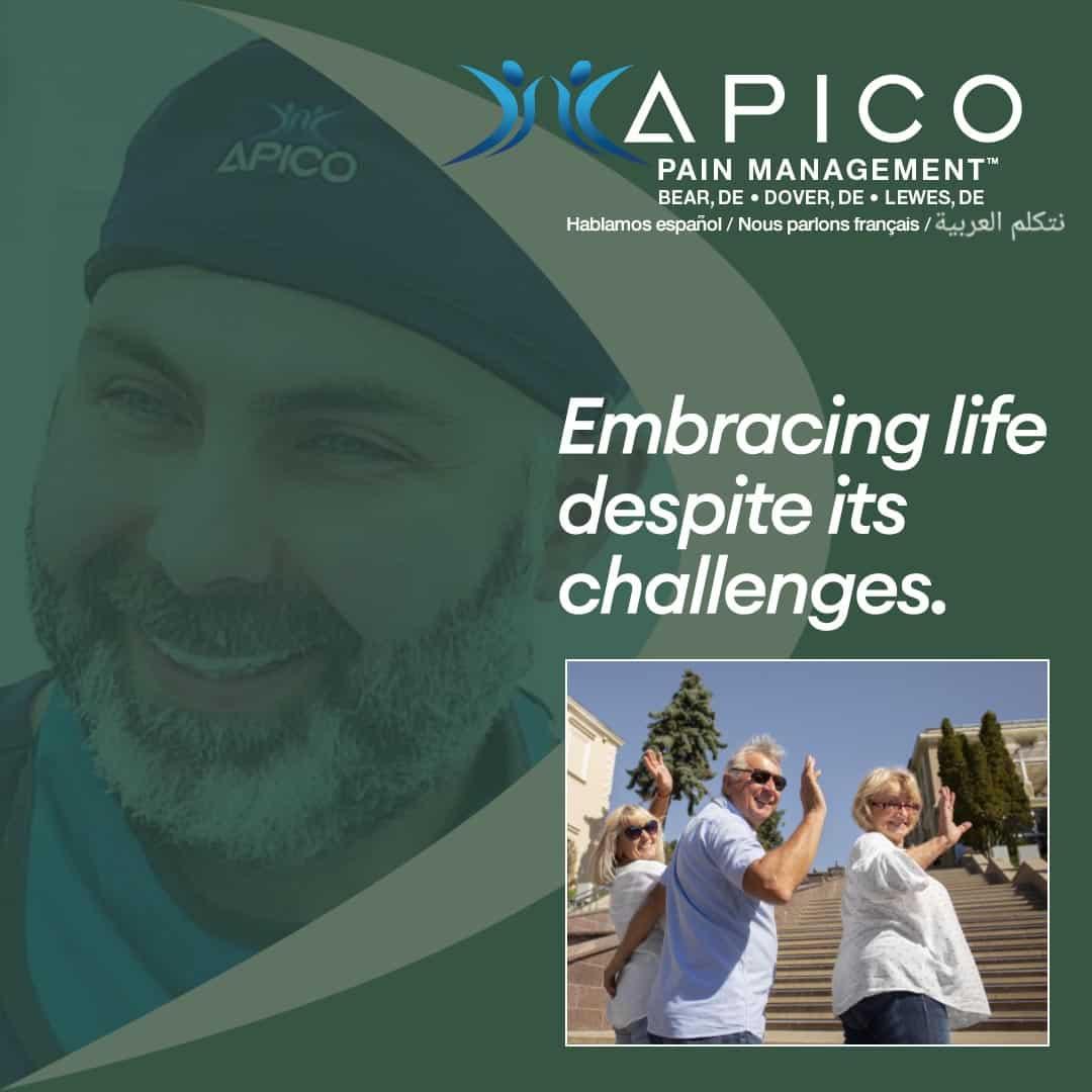 APICO Pain Management™ logo with the tagline "Embracing life despite its challenges," featuring a group of individuals engaging in outdoor activities on a staircase surrounded by greenery and buildings, symbolizing resilience and vitality. Locations listed include Bear, Dover, and Lewes, Delaware.
